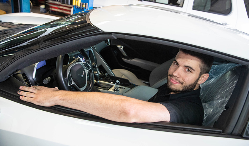 Young man in car.